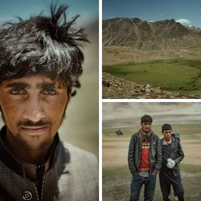 Chitral men and women wearing traditional attire in a village setting.