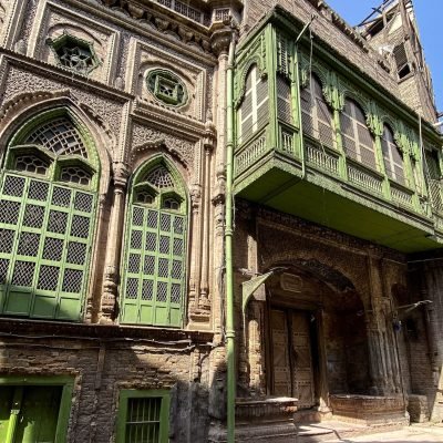 Historic building with green balcony