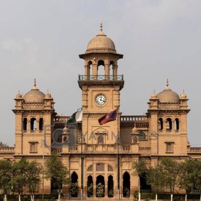 Government College University Lahore with red brick towers and clock dome