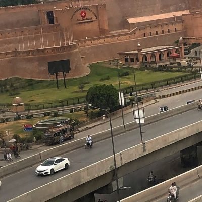 Historic fort with busy road below